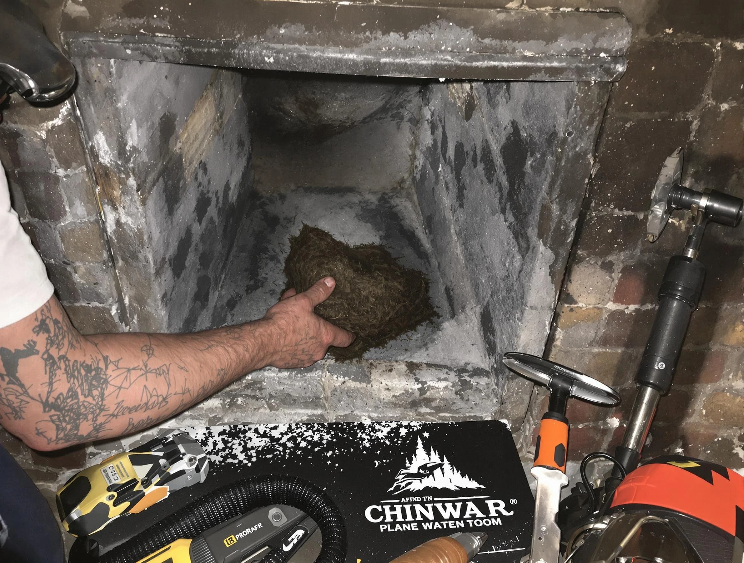 Senoia Chimney Sweep safely removing debris and screening chimney in Senoia, GA